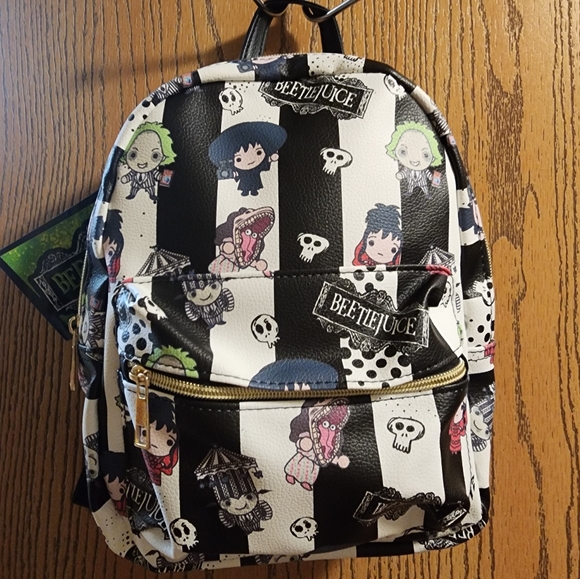 NWT Warner BROTHERS MINI BETTLEJUICE BACKPACK 🖤💚❤️ - Picture 1 of 8